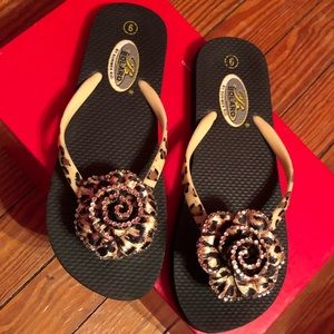 Leopard flower flip flops